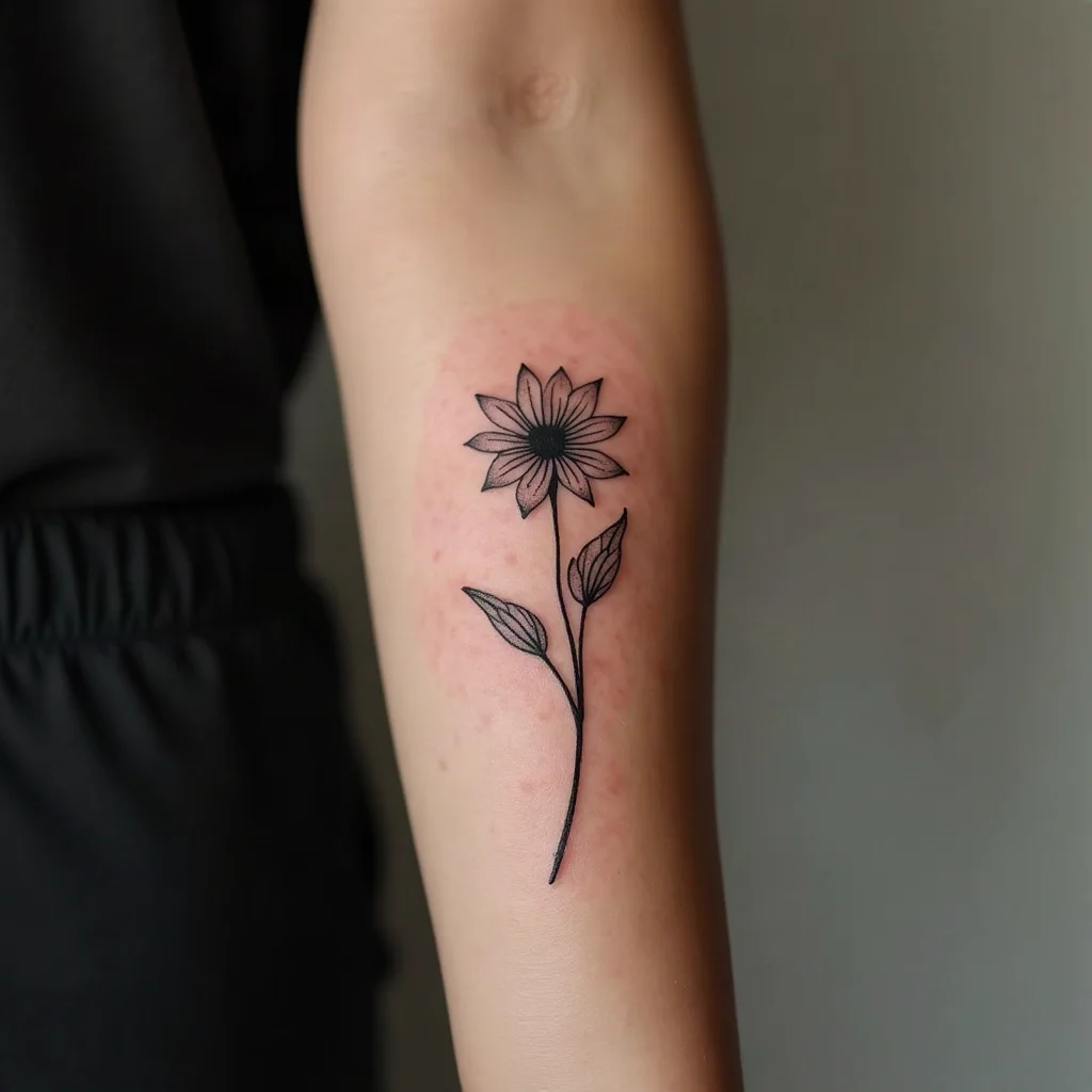 Fine-line birth flower stem tattoo on a mother's inner forearm, swapped with her son's flower